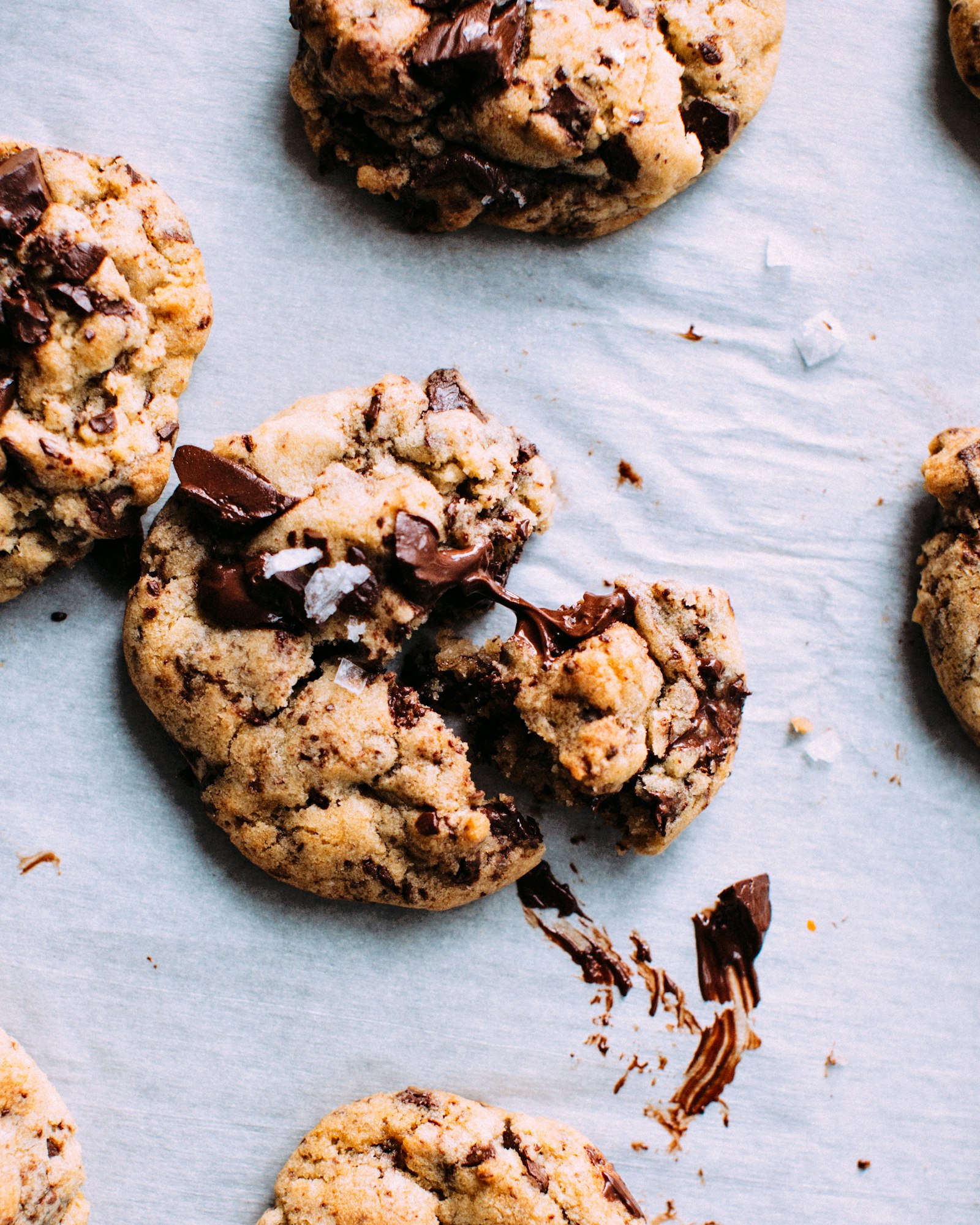 Stack of golden brown butter chocolate chip cookies with chocolate chunks