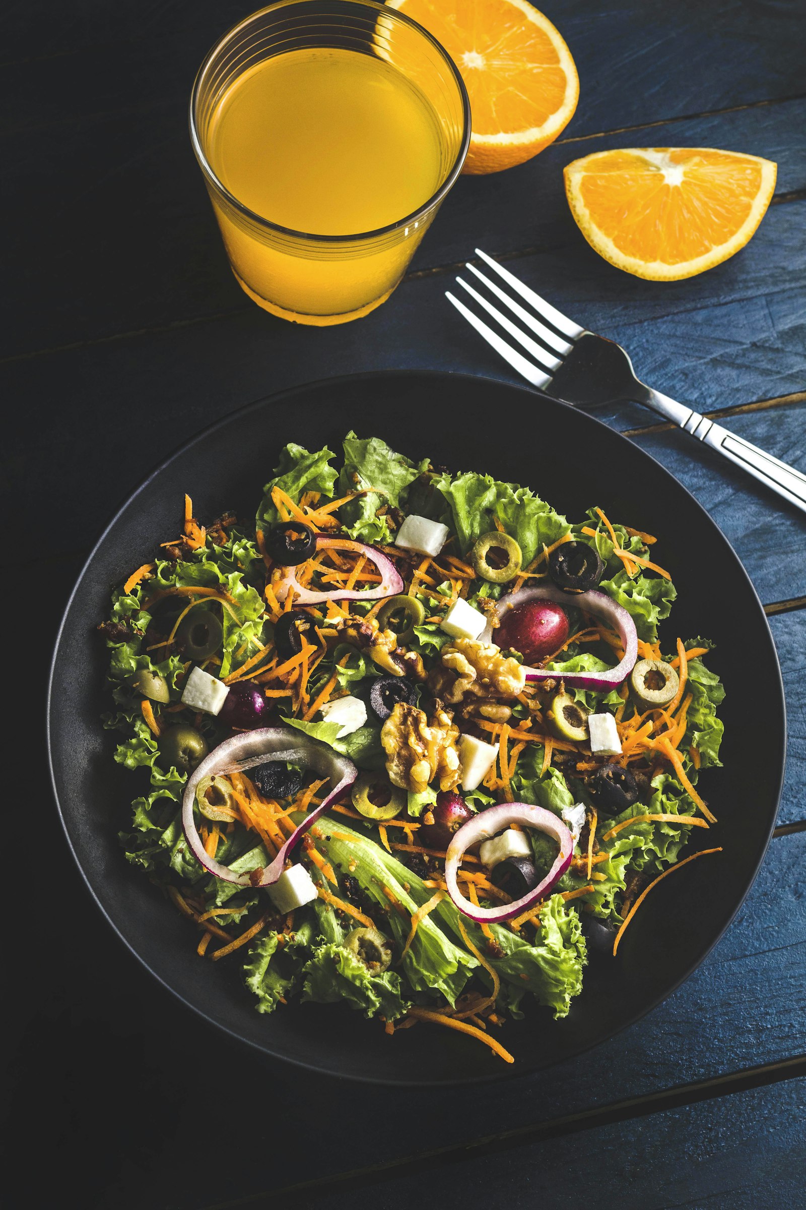 Greek salad with tomatoes, cucumber, red onion, olives and feta